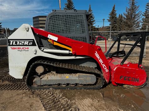 equipment trader skid steer|repossessed skid steers for sale.